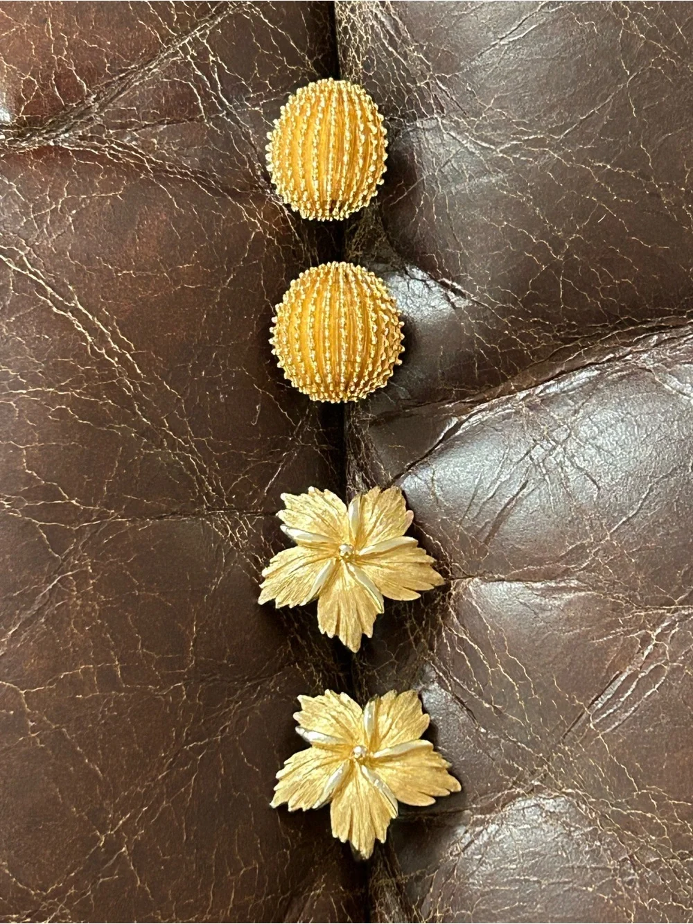 2 pairs of #CrownTrifari Clip-on Earrings. Gold-Tone Ribbed Domes and Florals.